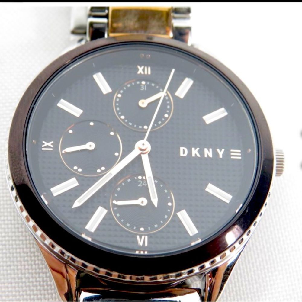 Brand new DKNY sliver and gold tone women’s wrist watch